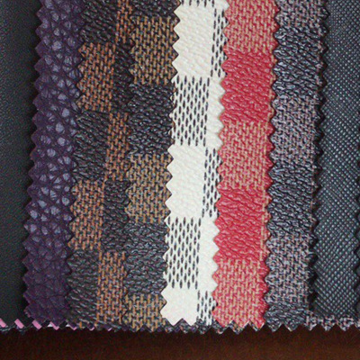 展示包装皮革批发 黑色荔枝纹PVC人造革包装定制文具革办公通用